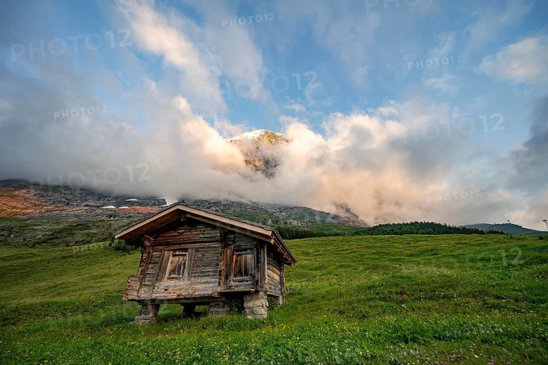 Alpine huts and alpine meadows, mountain landscape at sunset, Alpiglen, Grindelwald, Bernese Oberland, Switzerland