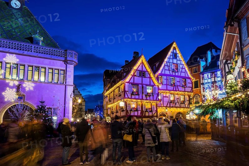 Colourfully illuminated and Christmassy decorated half-timbered houses, old town, blue hour, Colmar, Haut-Rhin department, Alsace, France