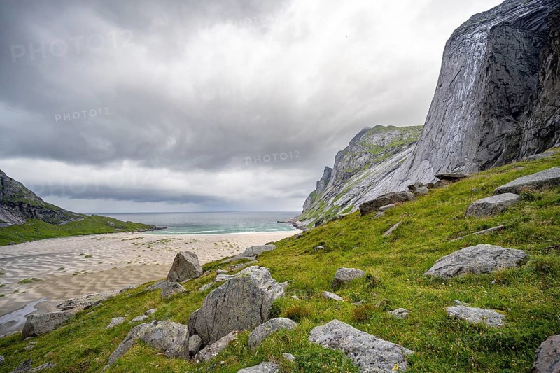 Bunesstranden sandy beach between rocky mountain peaks, Lofoten, Norway