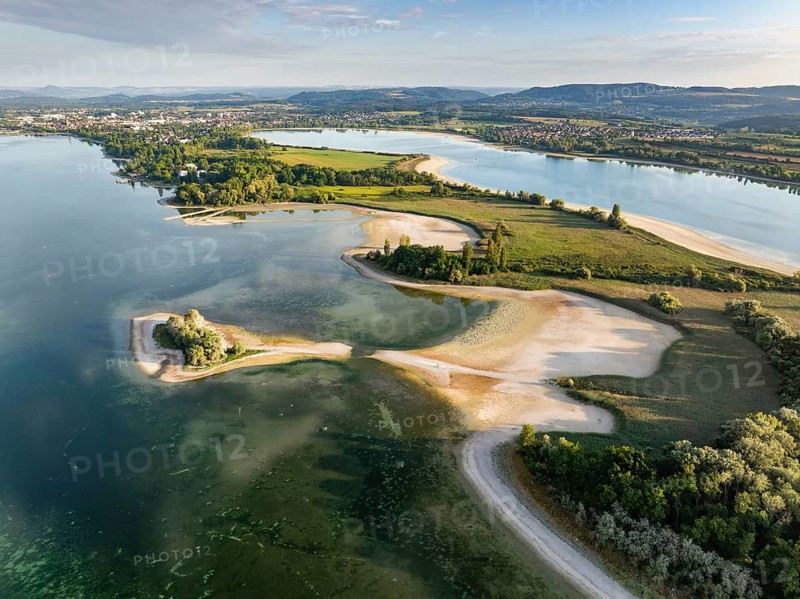 Aerial view of the Mettnau peninsula near Radolfzell on Lake Constance at historic lows, low tide at water level 286 cm, on the horizon the town of Radolfzell and the Hegauberge Mountains, Bodanrück on the right, Konstanz district, Baden-Württemberg, Germany