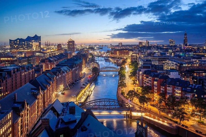 View of the Customs Canal, Speicherstadt, Elbe Philharmonic Hall and St. Michaelis at the Blue Hour, Hamburg, Germany