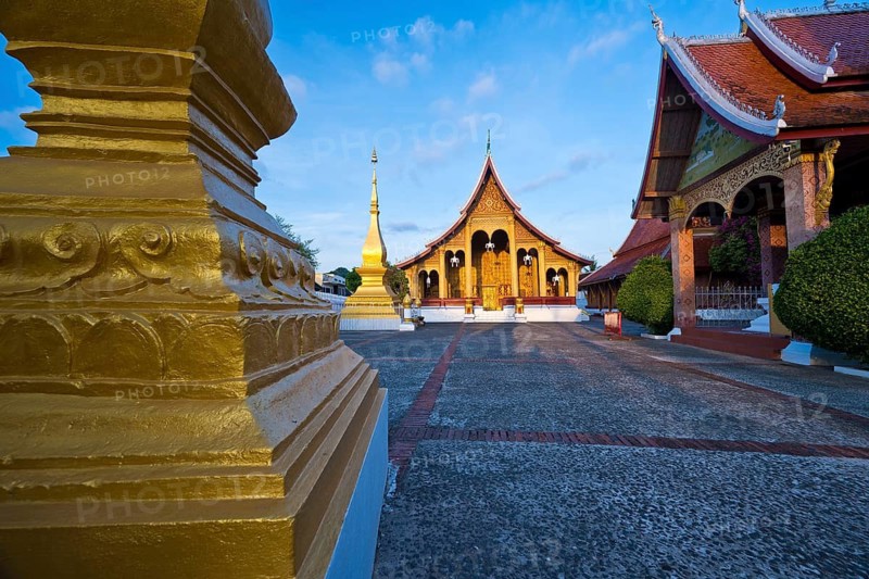 Sunrise, morning atmosphere at Wat Sibounheuang Buddhist monastery, Luang Prabang, Laos, Southeast Asia
