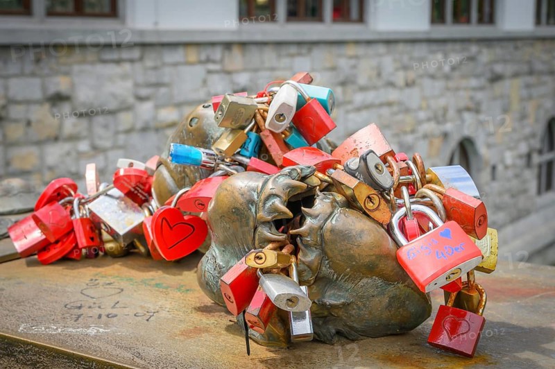 Love locks attached to a metal sculpture by Mirsad Begicby, on Butcher's Bridge, Ljubljana, Slovenia