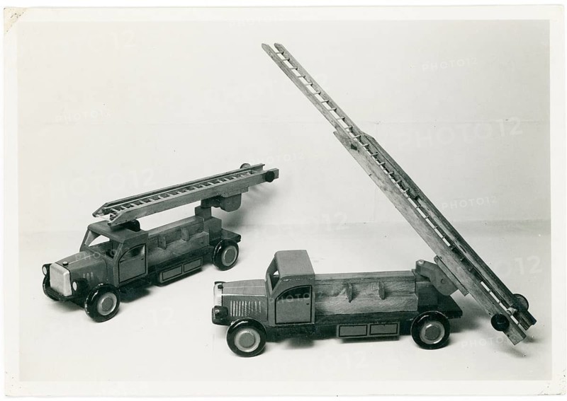 GDR, consumption, metal toys, fire department, children, two toy trucks with ladders, made of wood and in retro style, around 1956
