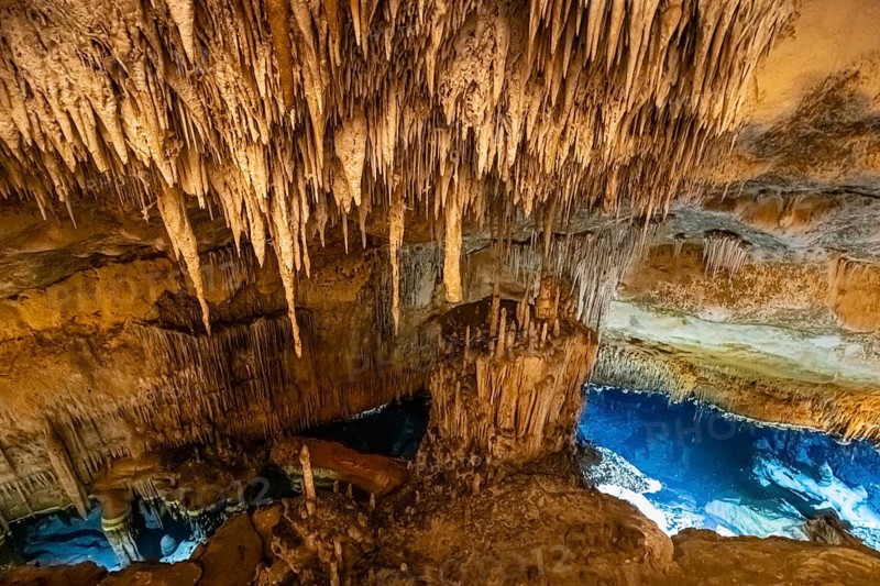 The Cuevas del Drach (Dragon Caves) are an impressive cave system on the east coast of Majorca, near Porto Cristo. They stretch for around 1, 200 metres and are home to Lago Martel, one of the largest underground lakes in Europe. The caves are famous for their fascinating stalactite and stalagmite formations, as well as their atmospheric lighting and the daily live classical concerts held on the lake. Cuevas del Drach, Porto Cristo, Majorca, Spain