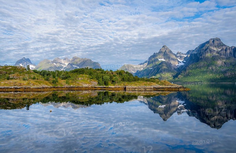 Picturesque fjord landscape at Raftsund fjord, mountains reflected in water, Vesterålen, Norway