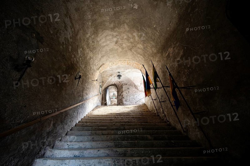 Stairway with flags, Hohenwerfen Fortress, Werfen, Pongau, Salzburg state, Austria