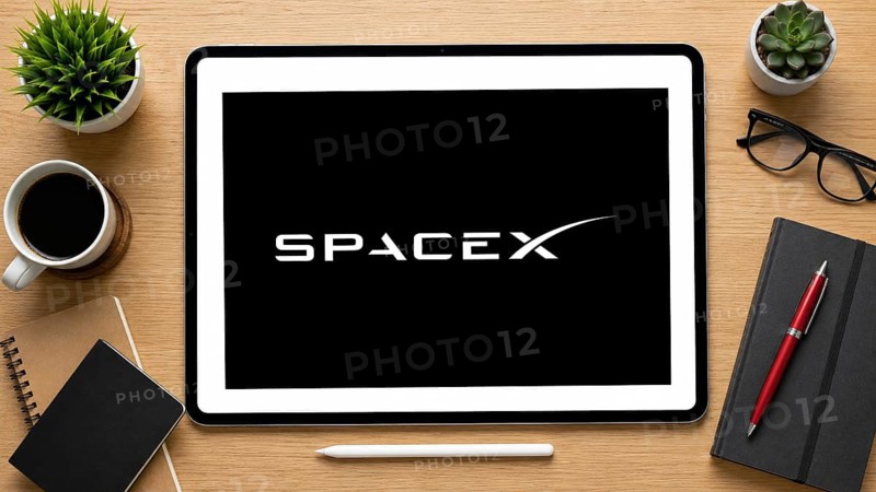 In this photo illustration, an iPad displays the Spacex logo on a minimalist wooden office desk, in Delhi, India on 14 August 2026
