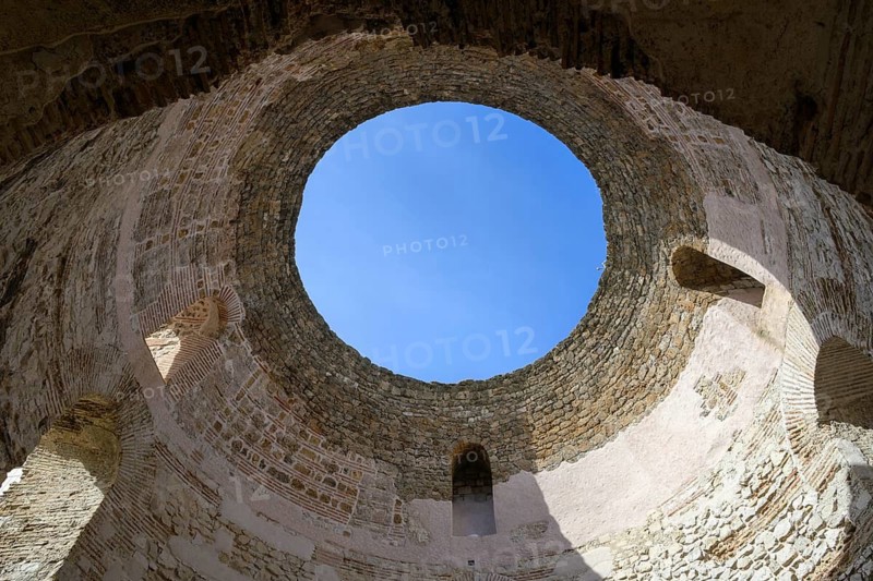 Looking up from the vestibule to the sky though the aperture of Diocletian's Palace in Split, Croatia. The vestibule is known for its excellent acoustics