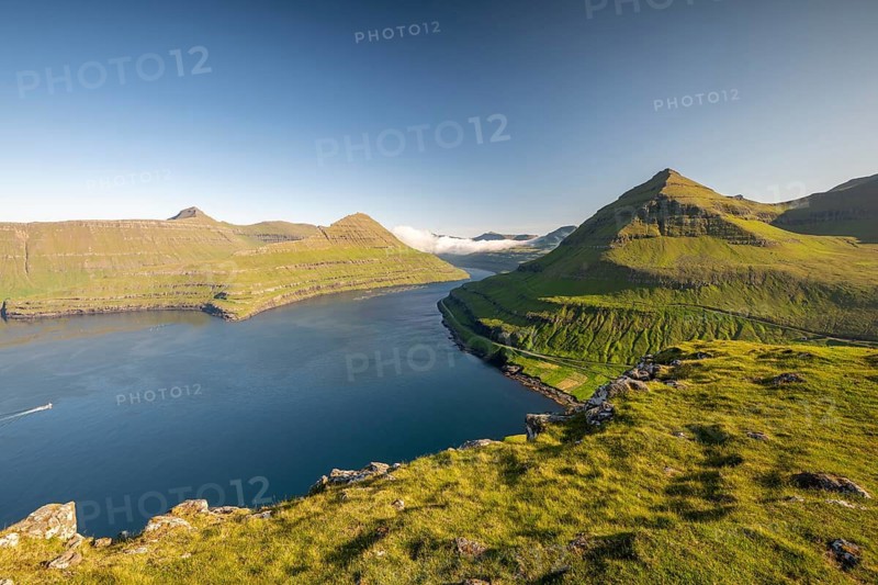 Panoramic view from Hvíthamar viewpoint on Funningsfjørður near Funningur on Eysturoy island, fjord with steep mountains, Faroe Islands, Denmark