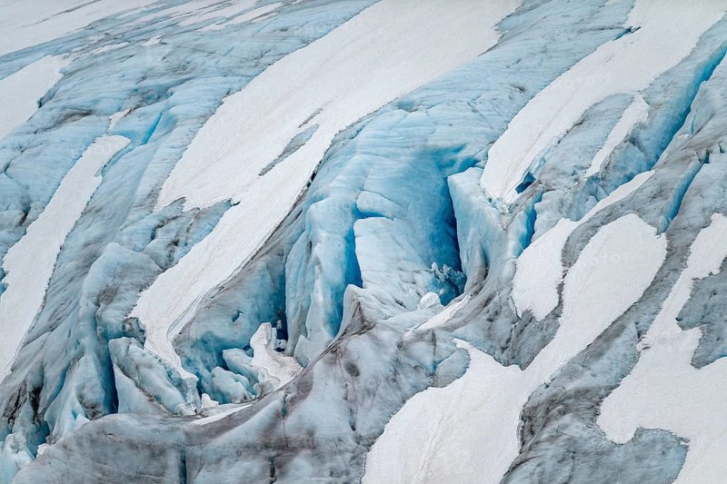 Blue rugged glacier ice with crevasses and snow, detail, Exit Glacier, Kenai Peninsula, Alaska, USA