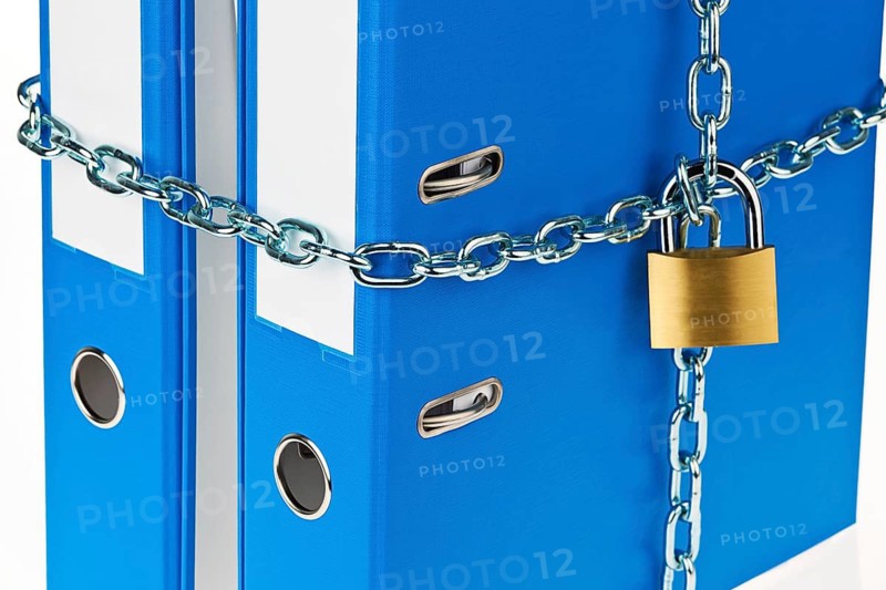 A file folder locked with a chain and padlock. Data Protection and Data Security, Austria