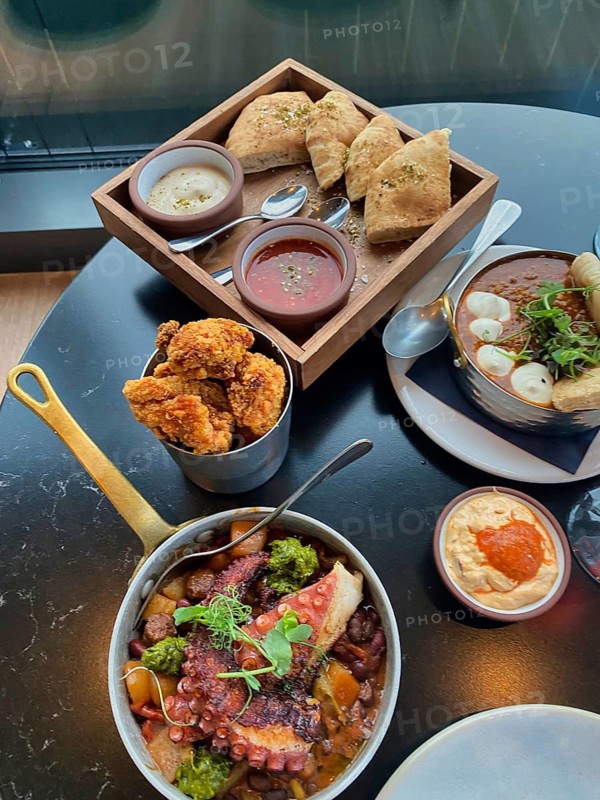 Grilled pulpo, squid, chicken with harissa yoghurt, bread, shakshukit, Levantine cuisine Israeli, Middle Eastern, food, Stuttgart, Baden-Württemberg, Germany