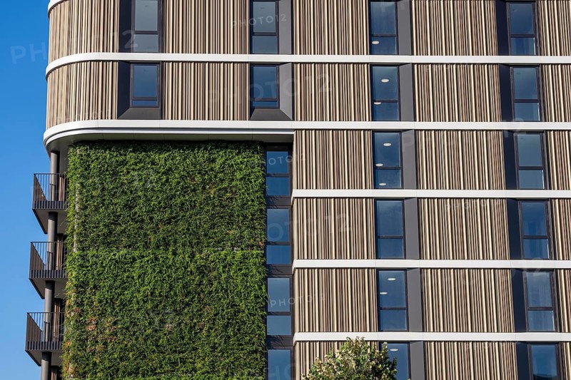 The Maaswaard residential high-rise building, on the Maas in Venlo, a so-called circular residential building, some of the building materials are recycled from other demolished construction projects, it is very energy efficient, with PV elements on the roof and in the façade and a partially green façade, Venlo, Limburg, the Netherlands