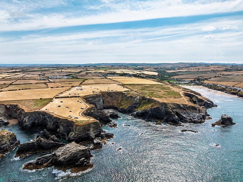 Farms and Fields over Cliffs and Porthcothan Bay from a drone, Porthcothan, Padstow, Cornwall, England, United Kingdom, Summer 2026