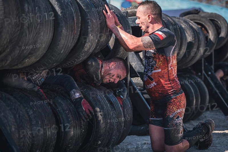 WROCLAW, POLAND - APRIL 7, 2018: Extreme running with obstacle RUNMAGEDDON. In the picture a runner on the Recruit route