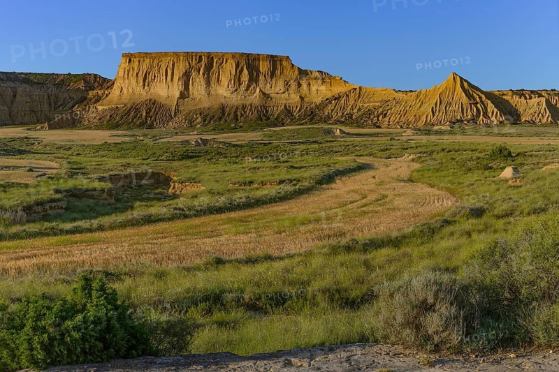 Bizarre rock formation in evening light in Bardenas Reales nature park Park, Navarra, Spain