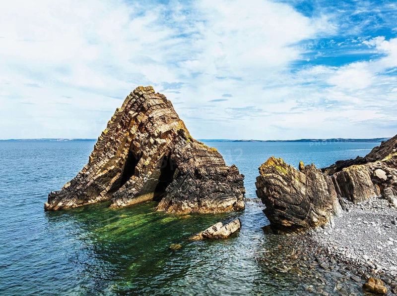 Blackchurch Rock and Cliffs over Mouthmill Beach from a drone, North Devon Coast, Devon, England, United Kingdom