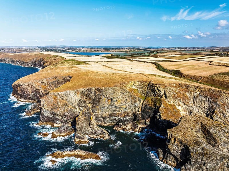 View of cliffs over Gunver Head and Trevone Bay from a drone, Trevone, Padstow, Cornwall, England, United Kingdom, Summer 2026