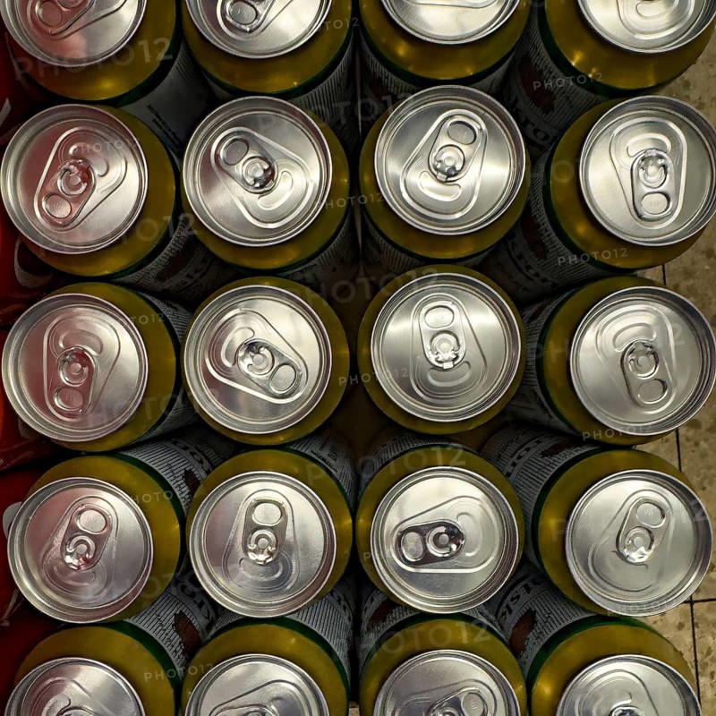 View from above of many aluminum beverage cans Aluminum cans for drinks with rip tab Ring pull ring remains on the can Technical term for this stay-on-tab, international