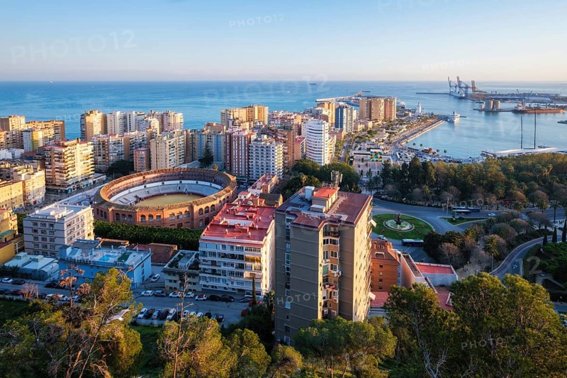 Aerial view of Plaza de Toros de La Malagueta bullring in Malaga, Spain, showing la malagueta bullring, port of malaga, and mediterranean sea