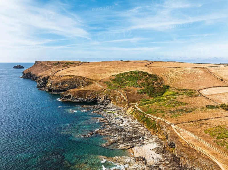 View of Pentire Point and Bay over Padstow Bay from a drone, Polzeath, Cornwall, England, Summer 2026