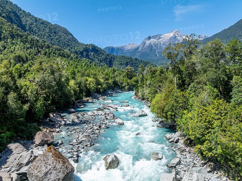 Valle Cholila mountain valley with Rio Blanco river, mountains and landscape near Hornopirén, Hornopirén National Park, aerial view, Patagonia, Los Lagos, Chile