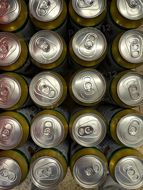 View from above of many aluminum beverage cans Aluminum cans for drinks with rip tab Ring pull ring remains on the can Technical term for this stay-on-tab, international