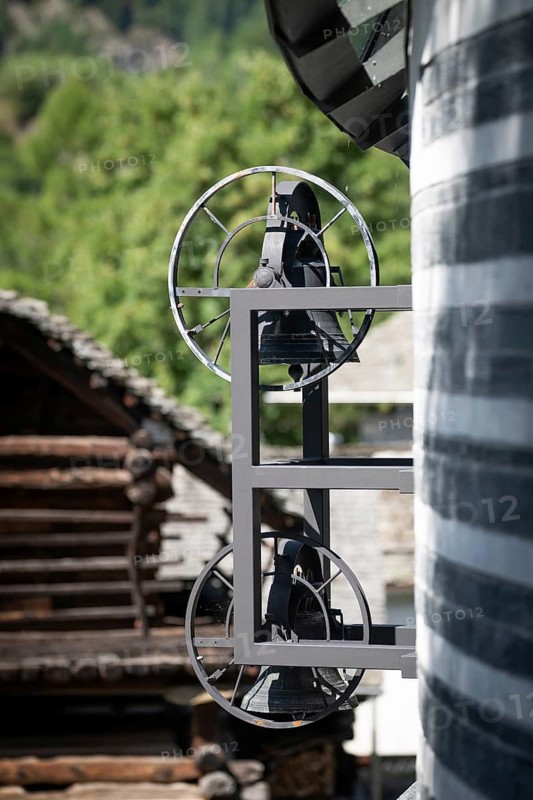 Bells of the village church destroyed by avalanche in 1986, new San Giovanni Battista church in the same location, architect Mario Botta, Mogno, Maggia Valley, Valle Maggia, municipality of Lavizzara, Canton of Tessin, Switzerland