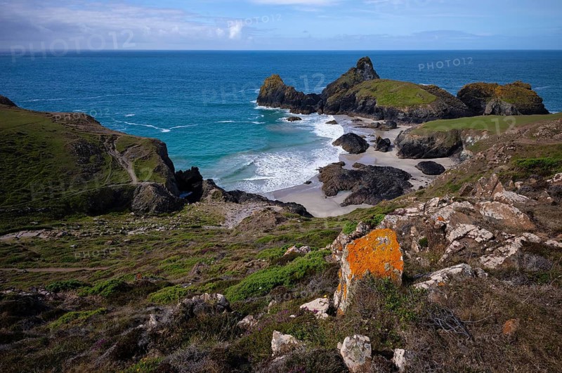 Rocks with lichens against coastal landscape, coast, rock formations, rocks, sandy beach, beach, sea, Kynance Cove, Mount's Bay, Lizard Peninsula, peninsula, Cornwall, England, Great Britain, Great Britain