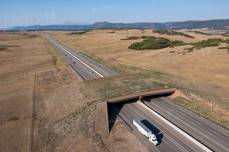 Monument, Colorado - A wildlife overpass for elk, deer, and pronghorn on Interstate 25 between Denver and Colorado Springs. The state expects the overpass and several tunnels for smaller animals to reduce vehicle-wildlife crashes by 90 percent. Previously, there had been an average of one crash per day