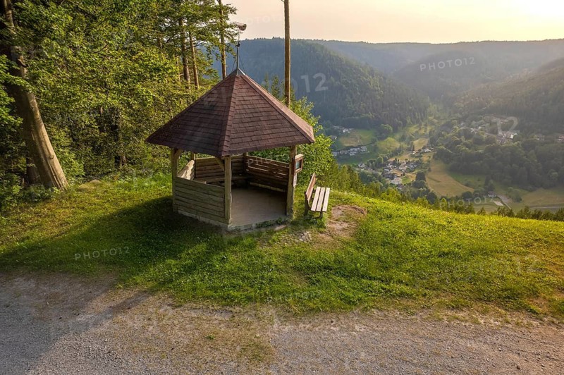 A wooden pavilion in a clearing with a relaxing view of a green valley, Simmelhütte, Bad Wildbad. germany