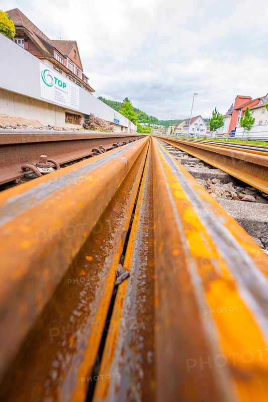Close-up of rusty tracks in deep perspective, Leonhard Weiß electrification station conversion, Waldshut. germany