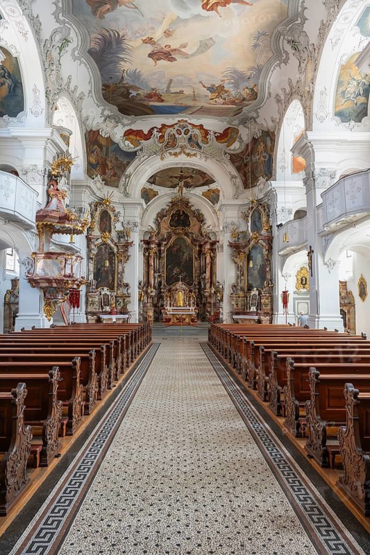 Magnificent baroque interior with ornate ceiling frescoes and stucco work by the Cathedral of Our Lady in Lindau am Lake Constance, Swabia, Bavaria, Germany