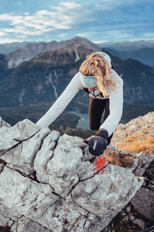 Trail running on the Grubigstein in the Tiroler Zugspitzarena in Tyrol in the Alps in Austria