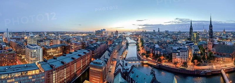 Panorama of HafenCity, Speicherstadt, Zollkanal, Elbe Philharmonic Hall and St. Katharinen's main church at the Blue Hour, Hamburg, Germany