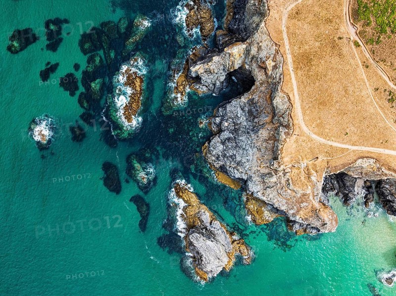 Top Down view of Cliffs over Porthcothan Bay from a drone, Porthcothan, Padstow, Cornwall, England, United Kingdom, Summer 2026