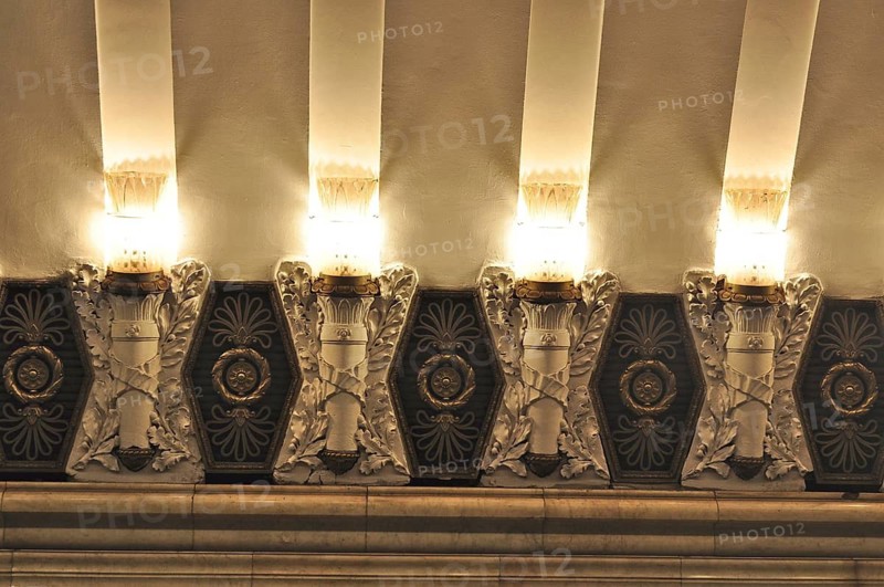Ornate ceiling decorations and warm lighting create a festive atmosphere in a subway station, metro, Saint Petersburg, St. Petersburg, Russia