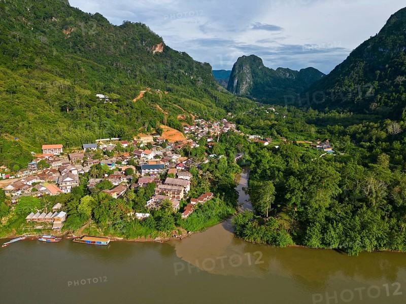 Aerial view, mountain landscape with part of the village of Nong Khiaw on the banks of the Nam Ou River, Nong Khiaw, northern Laos, Louangphrabang Province, Laos
