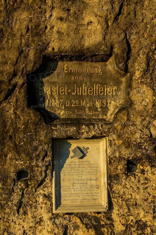 Sunrise on the Bastei Rock, memorial plaque for the Bastei celebration and the two pastors who introduced the term Saxon Switzerland, Rathen, Saxony, Germany