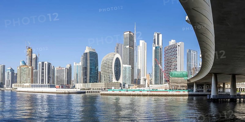 Downtown Dubai skyscrapers with Burj Khalifa skyline on the Marasi Bay Business Bay Canal Panorama in Dubai, United Arab Emirates