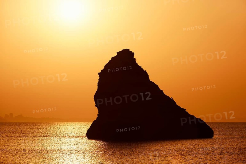Rocks in the sea at sunrise, Praia Dona Ana, Lagos, Algarve, Portugal