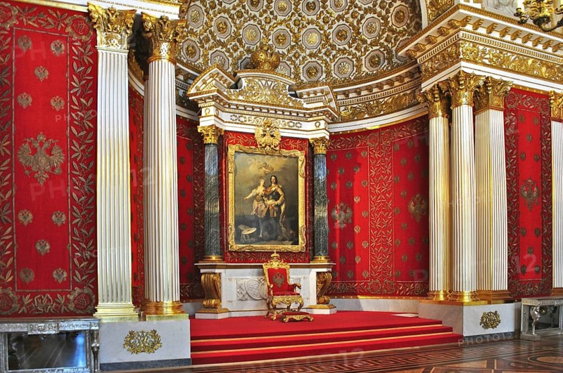A magnificent throne room in the palace, decorated in red and gold with a painting, Winter Palace, Hermitage, Saint Petersburg, St. Petersburg, Russia