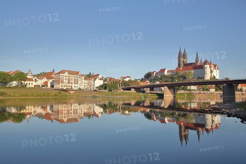 Cityscape with old town bridge, castle hill with Albrechtsburg and cathedral, reflection in the river Elbe, Meissen, Saxony, Germany