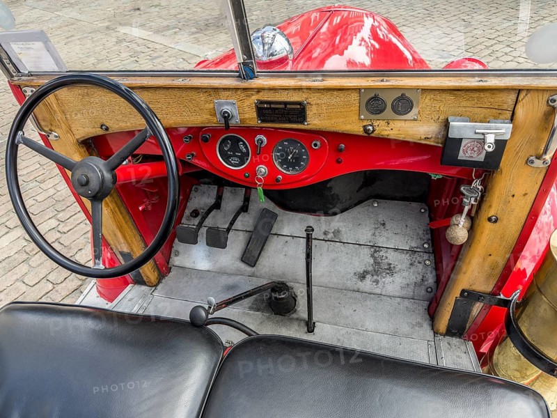 Nterior of a 1940 Volvo truck, featuring the steering wheel and dashboard. The vehicle currently serves as a vintage fire truck in Ystad, Skåne County, Sweden, Scandinavia