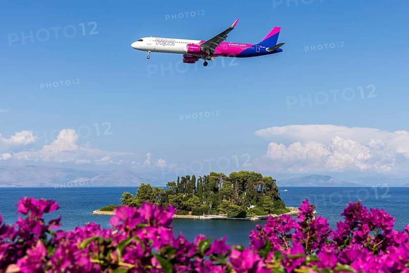 A Wizzair Airbus A321neo aircraft with the license plate 9H-WNY at Corfu airport, Greece