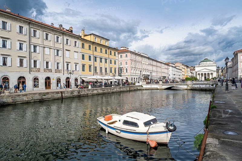 Grand Canal with restaurants and boats, Sant'Antonio Taumaturgo church in the back, Borgo Teresiano, Trieste, Friuli-Venezia Giulia region, Italy