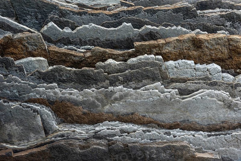 Geological formation of sandstone and limestone layers, Flysch on Itzurun Beach in Zumaia, Spain