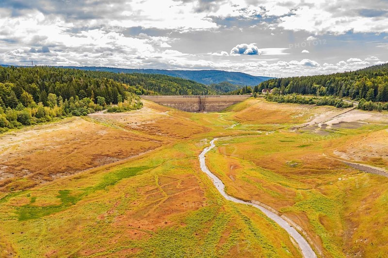 Wide view of a valley with a dam and a winding river, rehabilitation of the Schwarzenbach dam, Forbach, Black Forest, Germany