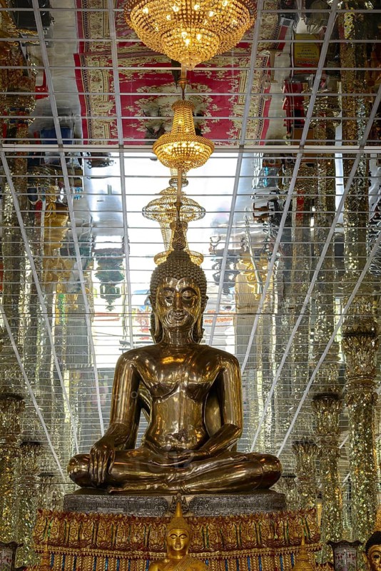 Silver Buddha statue, Bhumispara-mudra: Gautama Buddha at the moment of enlightenment, Wihan Kaeo (glass temple) : a breathtaking, mirrored ordination hall, Wat Muang, Ang Thong Province, Isan, Thailand